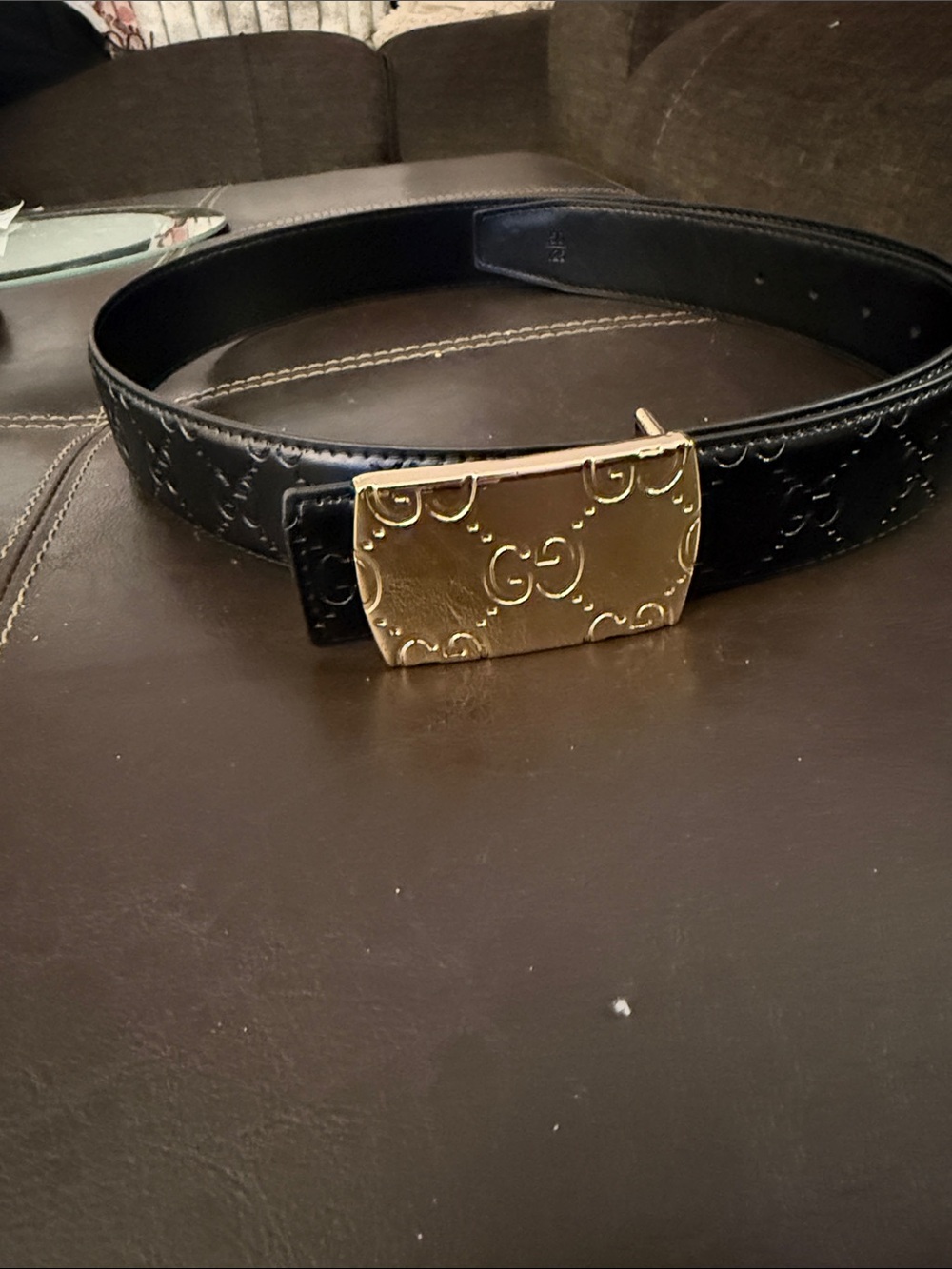 Belt buckle on leather belt
